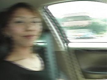She is playing with her hairy pussy in car
